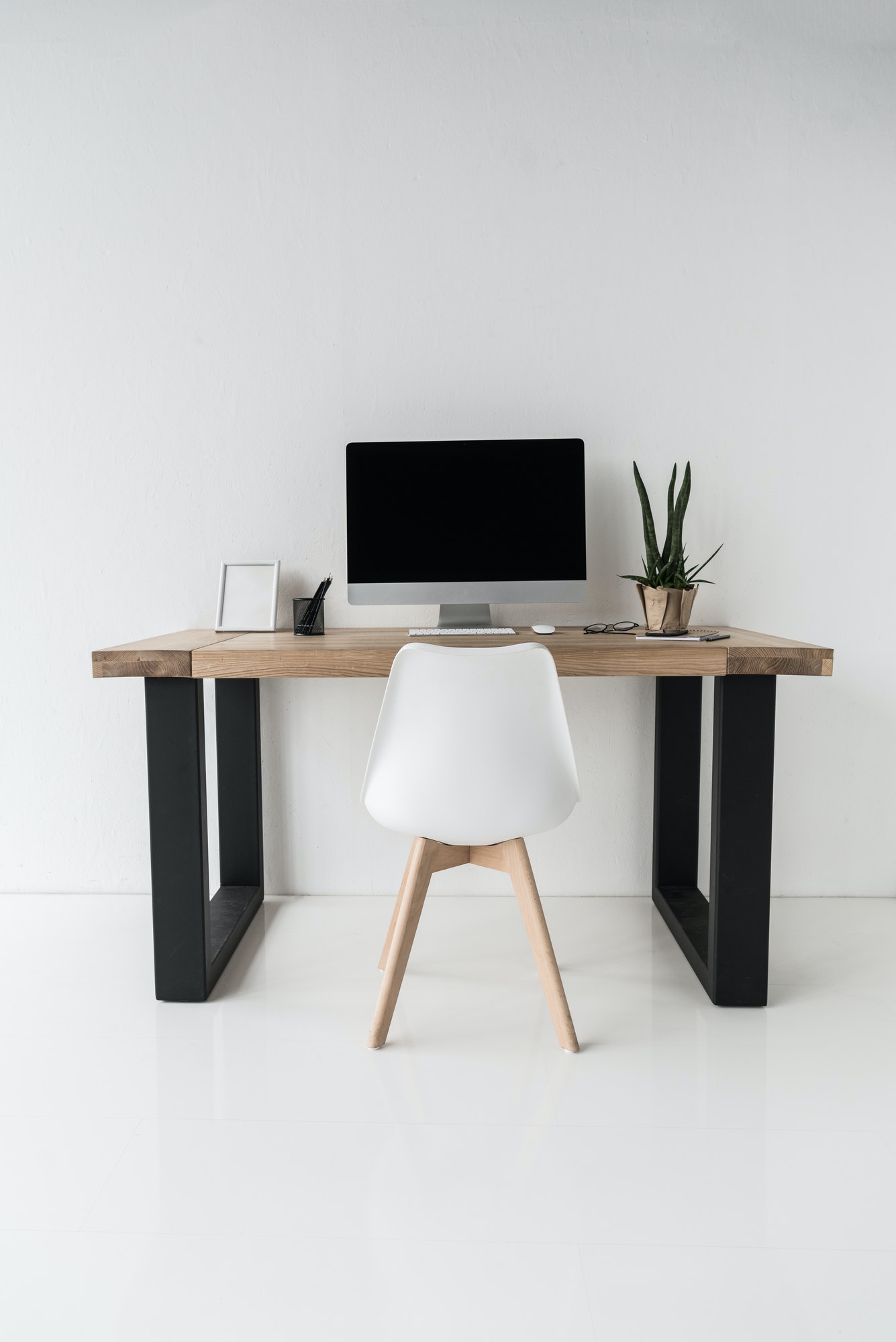 workplace-with-computer-and-stylish-furniture-in-modern-office-1